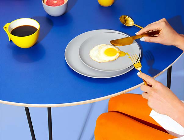 Person Eating with Juice and Coffee